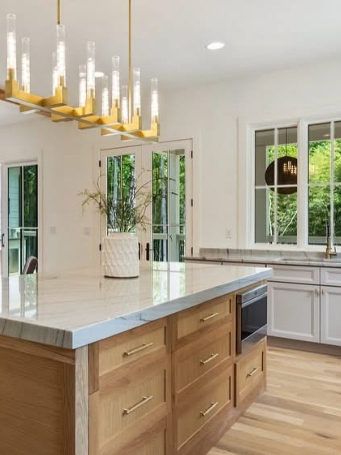 Warm Contemporary Kitchen Remodel by Affordable Remodeling project photo